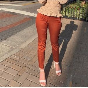 Burgundy colored khaki pants